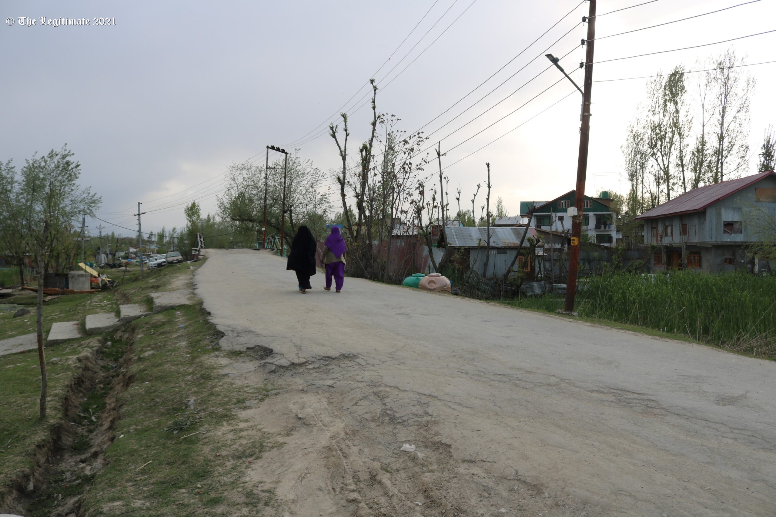 National Conference government built the macdamzied road followed by concrete drainage system and electricity poles to settle down illegal colony inside Dal Lake/Photo/The Legitimate